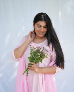 Blush pink cotton Anarkali set with a flowy silhouette and soft, breathable fabric for elegant comfort.