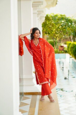 Rust embroidered cotton kurta set with dupatta showcasing fine craftsmanship and breathable fabric. Designed with Lumaara Fashions’ excellence in quality and detail.